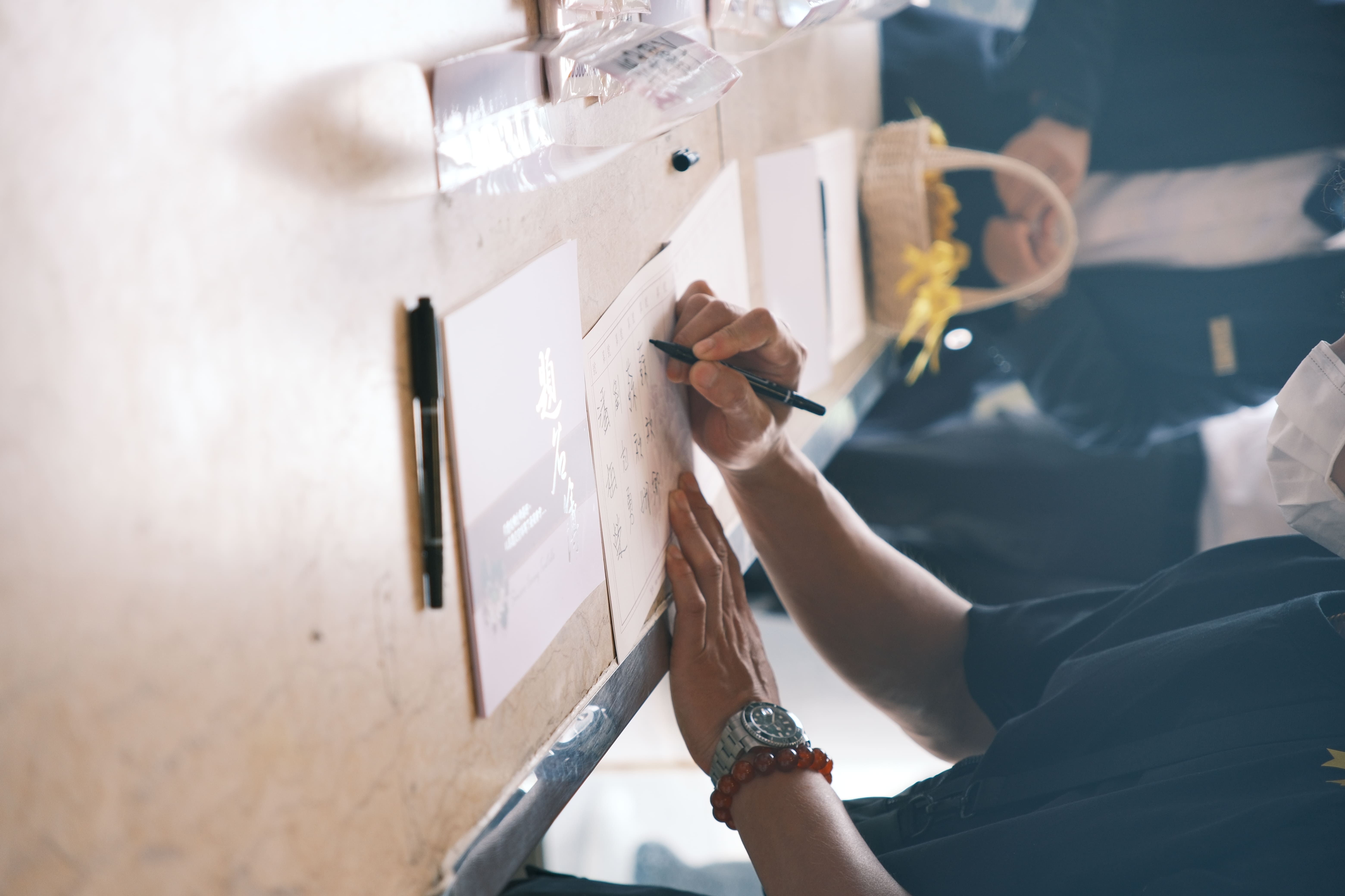 家屬前往火化追思感恩儀式簽到處