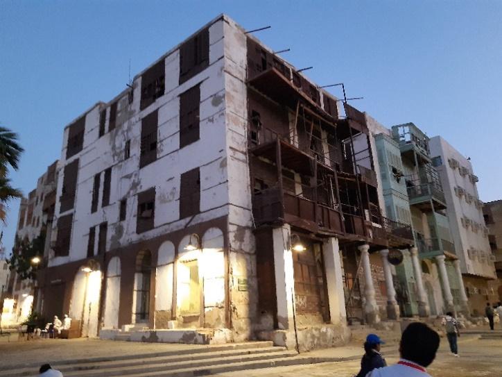A picture containing building, outdoor, sky, street Description automatically generated